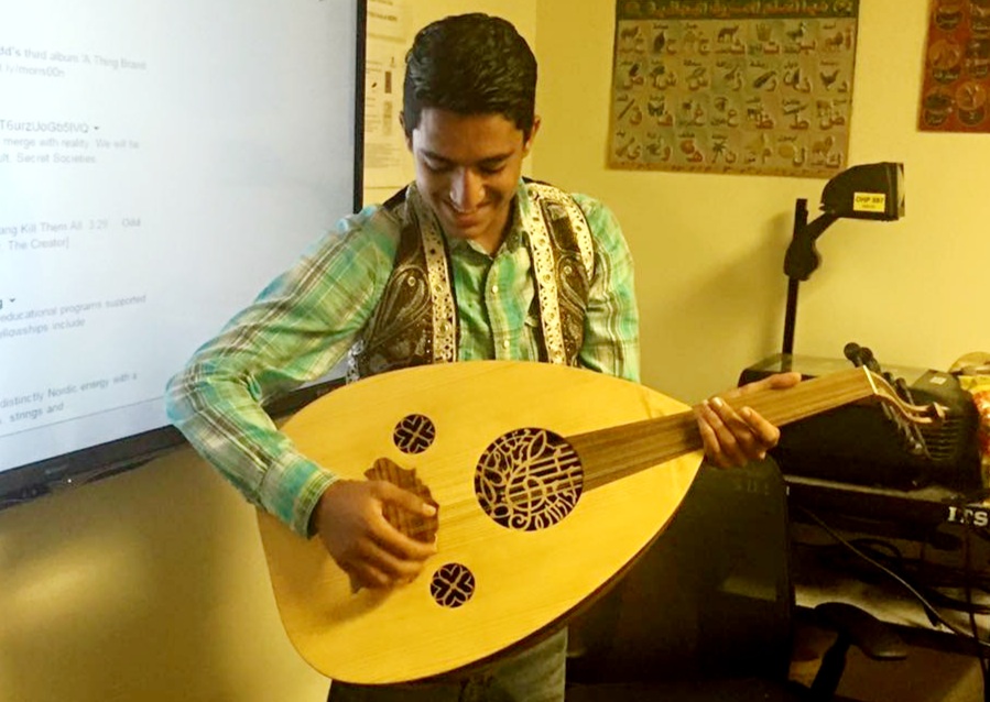 student playing an instrument